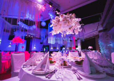 A Grand restaurant and a ballroom in a luxury hotel. The interior design is executed in classical style